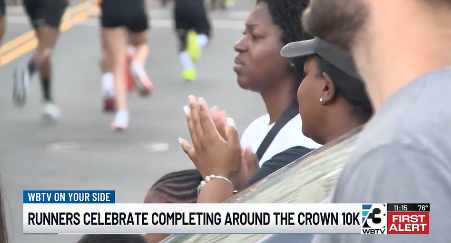 Thousands of runners shut down I-277 for Around the Crown 10K race (WBTV)