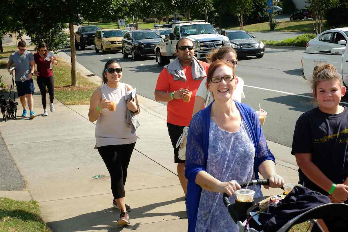 People smiling while walking together